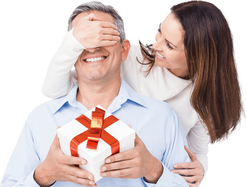 Wife Surprising Husband with Gift Box and Candid Laugh