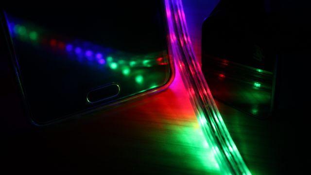 Colorful LED Strip Lights Reflected on Smartphone Screen in Dark Room - Download Free Stock Photos Pikwizard.com
