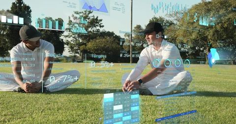 Golfers discussing augmented reality overlays on sunlit fairway wearing smartwatches