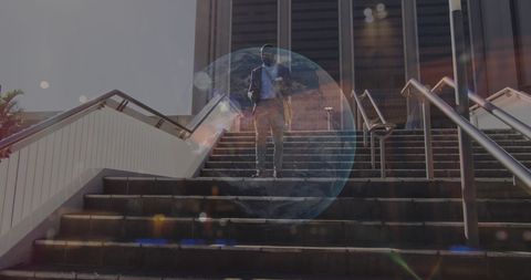Businessman Engaged in Digital Data Analysis on Stairs - Download Free Stock Images Pikwizard.com