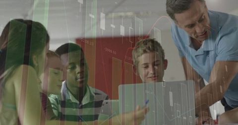 Teacher mentoring students in classroom with stock chart overlay