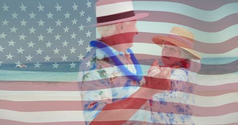 Elderly Couple Dancing on Beach with American Flag Overlay