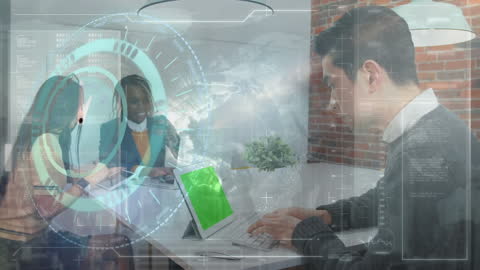 Diverse Business Team Collaborating on Innovative Tech Project