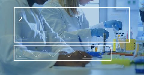 Scientists in Laboratory Analyzing Data with Technological Overlay - Download Free Stock Images Pikwizard.com