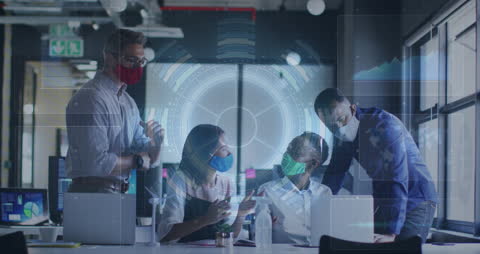 Innovative Diverse Team Analyzing Digital Data in Office