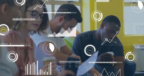 Multicultural Team Engaging in Data-Driven Office Meeting