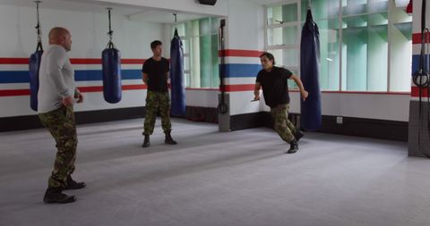 Army self-defense training in gym