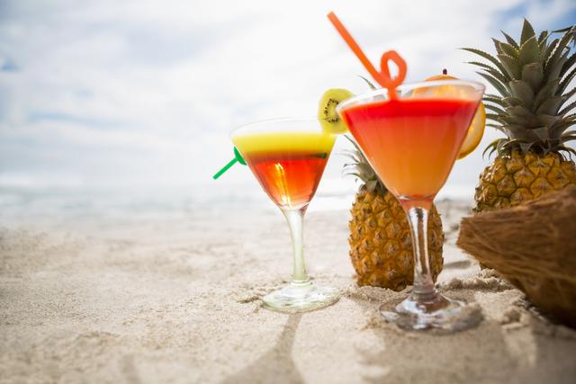Tropical Beach Cocktails with Pineapple and Coconut - Download Free Stock Photos Pikwizard.com