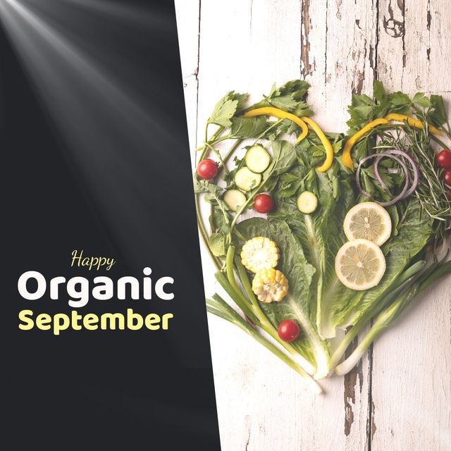 Composite of various vegetables arranged in heart shape on table and happy organic september text. Copy space, love, fresh, organic food, farming, healthcare, awareness and campaign concept.