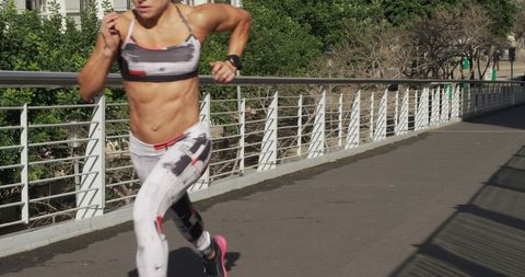 Caucasian Woman Running in City on Sunny Day - Download Free Stock Images Pikwizard.com
