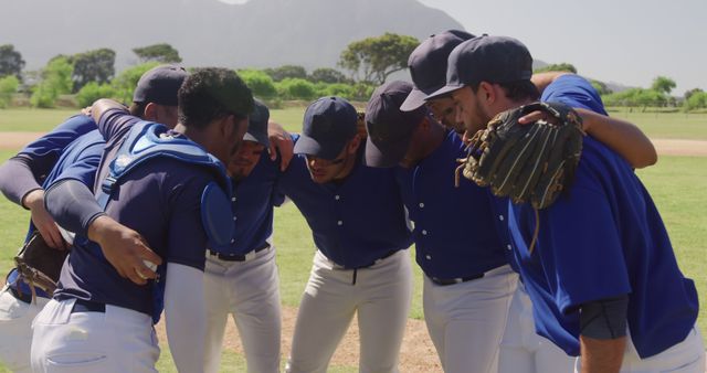 Baseball Team Huddling Midfield in Blue Uniforms Before Game - Download Free Stock Images Pikwizard.com