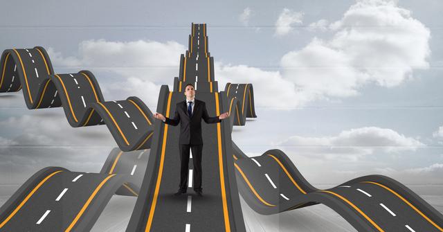 Digital composite image of confused businessman standing on wavy roads - Download Free Stock Photos Pikwizard.com