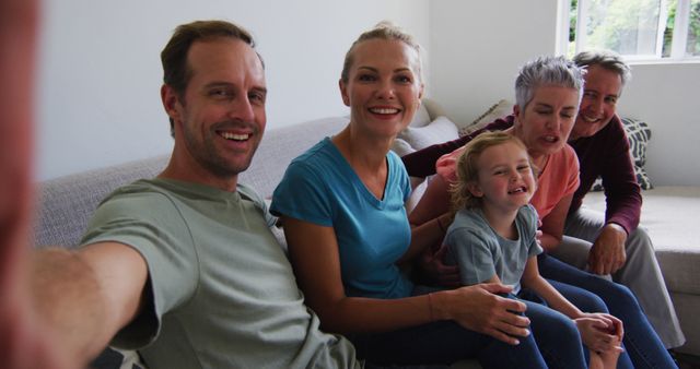 Happy Multigenerational Family Taking Selfie on Couch - Download Free Stock Images Pikwizard.com