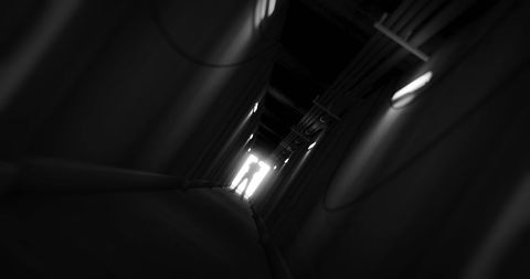 Mysterious Silhouette in Dark Industrial Corridor - Download Free Stock Images Pikwizard.com