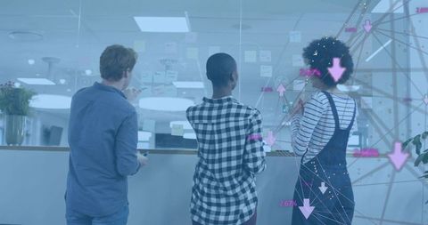 Team brainstorming with sticky notes and augmented reality data visualization on glass