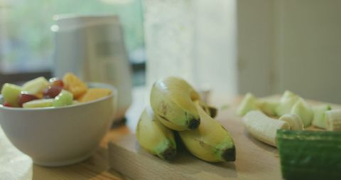 Bananas and Fresh Ingredients on Wooden Cutting Board - Download Free Stock Images Pikwizard.com