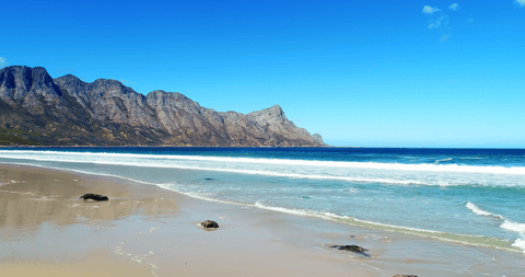 transparent waves crashing on peaceful scenic beach - Download Free Stock Videos Pikwizard.com