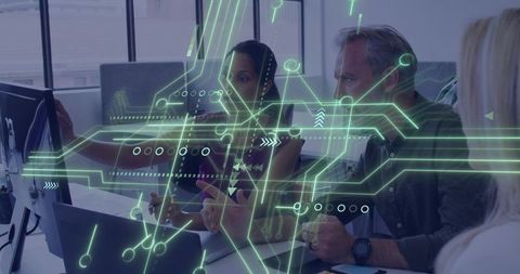Pointing woman explaining data analytics to colleagues with AR circuit overlay, teamwork