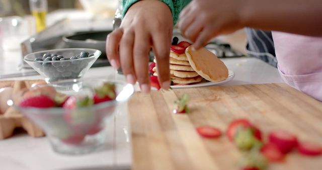 Mother and Daughter Preparing Fresh Homemade Pancakes Together - Download Free Stock Images Pikwizard.com