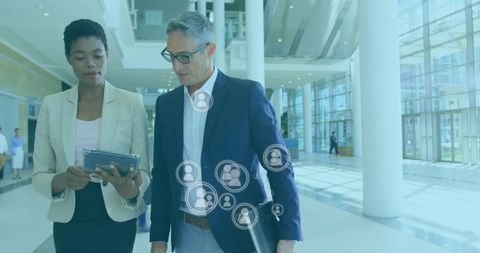Business Professionals Networking with Digital Interface in Modern Office - Download Free Stock Images Pikwizard.com