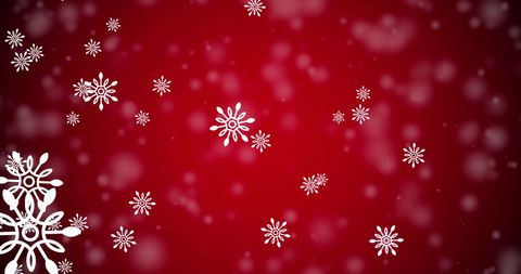 Snowflakes Gently Falling on Red Christmas Background