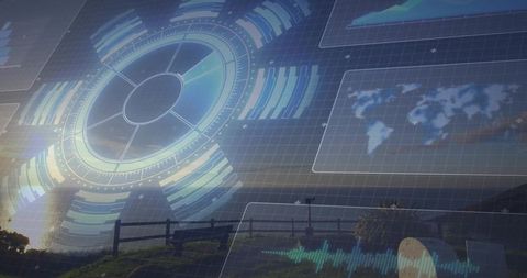 Futuristic hud overlay on coastal landscape at sunset with world map and data panels