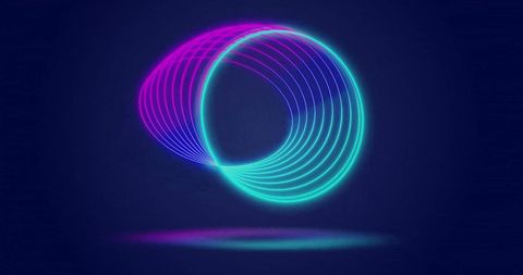 Colorful Neon Light Circles in Motion Over Dark Background