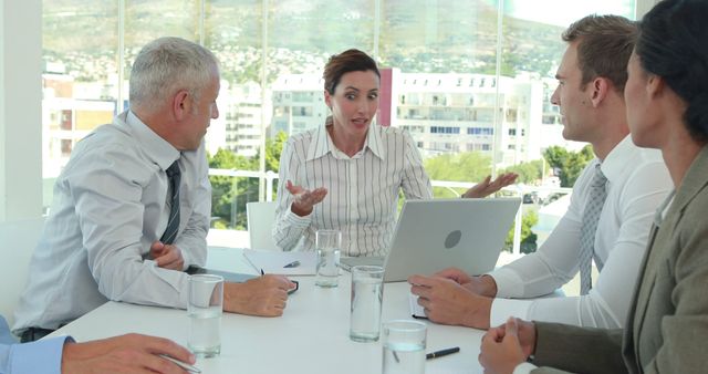 Team Meeting With Surprised Businesswoman Discussing Project Ideas - Download Free Stock Images Pikwizard.com