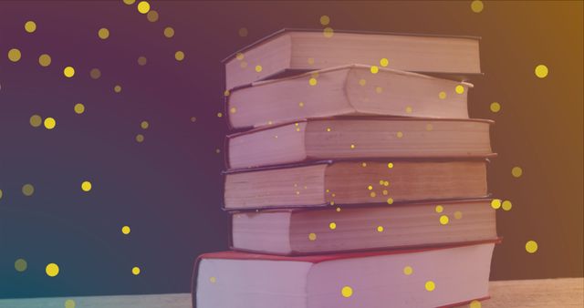 Pile of aged books radiates enchanting yellow light against dark backdrop, inspiring whimsical and magical atmosphere. Ideal for literary events, reading advocacy, education promotions, book fairs, or magical and mystic themes.