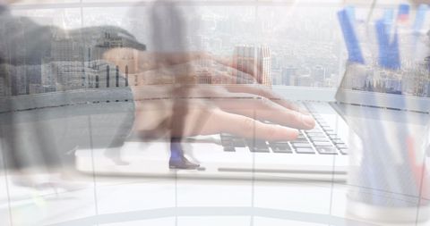 Hands Typing on Laptop Amid Fast-Paced Office Environment - Download Free Stock Images Pikwizard.com