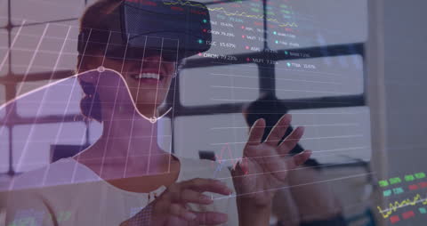 Woman Using VR Headset to Analyze Live Data