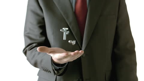 Businessman Juggling Bolts and Screws in Slow Motion