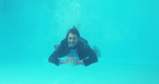 Businessman Underwater in Suit Showing Resilience and Uniqueness - Download Free Stock Images Pikwizard.com