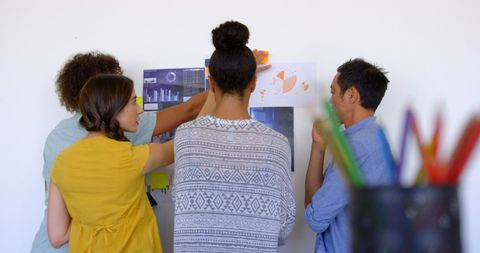 Creative Team Brainstorming with Diagrams and Notes