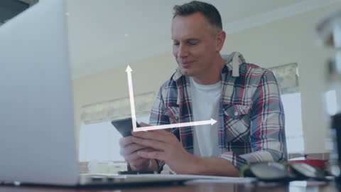 Happy Man Engaging with Smartphone Technology at Home