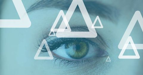 Abstract technology overlay on woman's eye