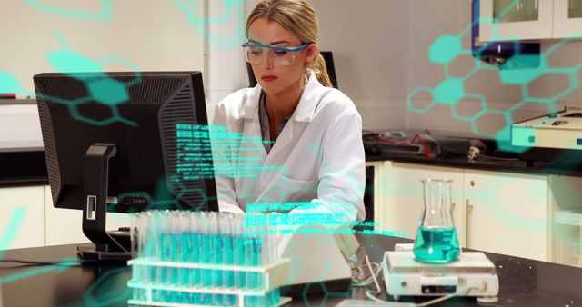 Scientist in a modern laboratory settings sits in front of a computer, analyzing scientific data with digital overlay elements. Wearing protective goggles and a white lab coat, focusing on research and data analysis. Test tubes with blue chemicals and advanced scientific equipment visible. Useful for representing scientific research, technological advancement, STEM education, and innovative lab work.