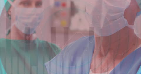 Surgeons Analyzing Medical Data with Graphical Overlay