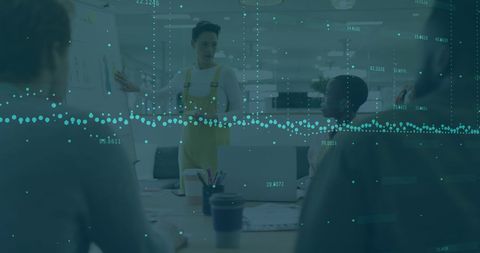 Financial data overlaid on diverse business meeting in modern office