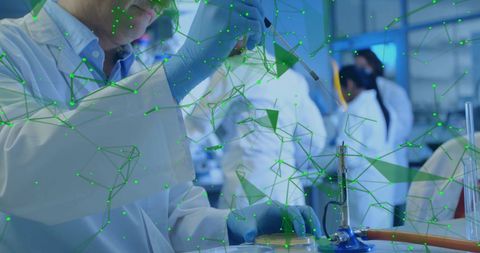 Scientist Analyzing Data in Innovative Laboratory with Digital Network Concept - Download Free Stock Images Pikwizard.com