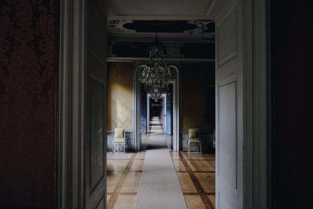 Elegant Old Mansion Hallway with Chandelier and Vintage Furniture - Download Free Stock Photos Pikwizard.com