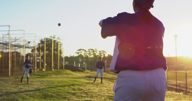 Sunset Baseball Practice with Catcher Throwing Ball - Download Free Stock Images Pikwizard.com