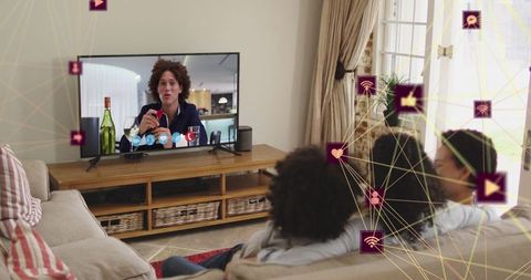 African american family using interactive smart television