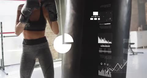 Female Athlete Jabbing at Punching Bag with Data Overlays