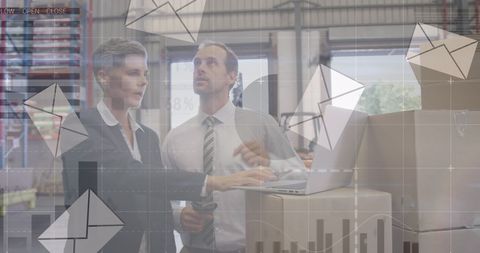 Warehouse Business Team Reviewing Delivery Strategy with Email Graphics - Download Free Stock Images Pikwizard.com