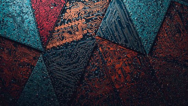 Tessellated triangular pcb mosaic featuring copper traces, vias and metallic texture