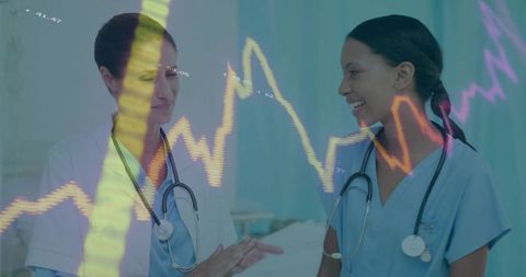 Medical Professionals Discuss Patient Health with Digital Interface