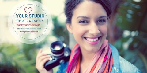 smiling photographer holding camera promoting services - Download Free Stock Templates Pikwizard.com