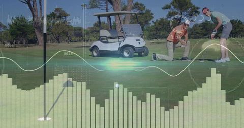 Golfers Analyzing Data with Technology Interface on Putting Green