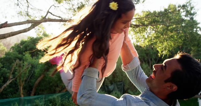 Father Lifting Daughter in Outdoor Park - Download Free Stock Images Pikwizard.com